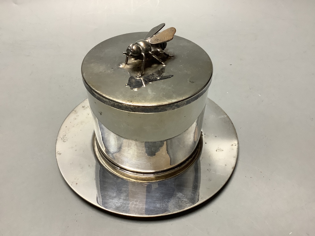 A Brazilian white metal preserve pot on stand with bee finial, height 9.2 cm
